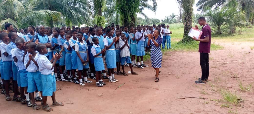 MOMF Staff with Children MOMF staff with children at the assembly ground